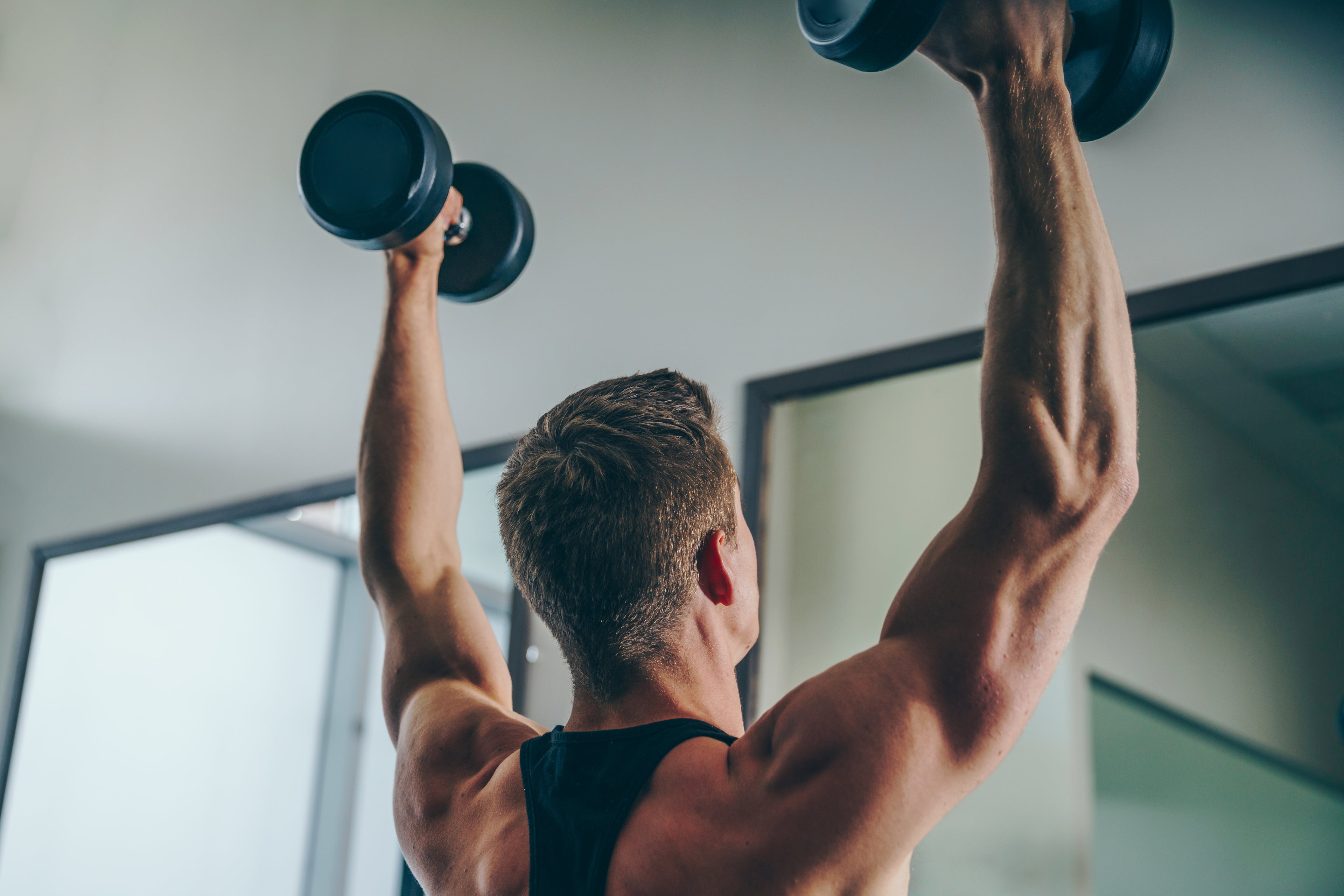 Load video: Man lifting weights